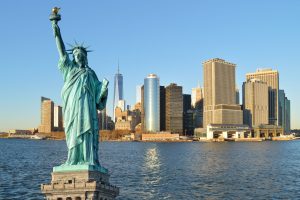 Collage with Manhattah skyline and Statue of Liberty.